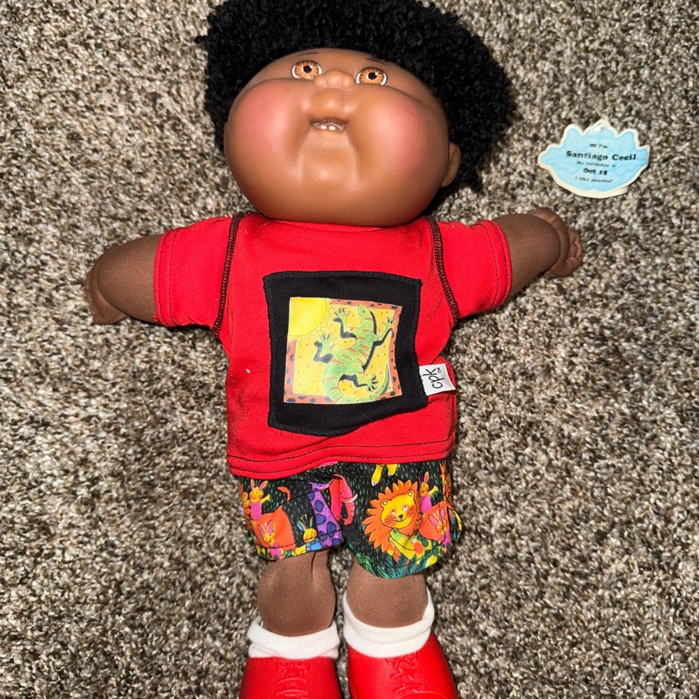 Colorful Kids Doll with Red Shirt and Patterned Shorts